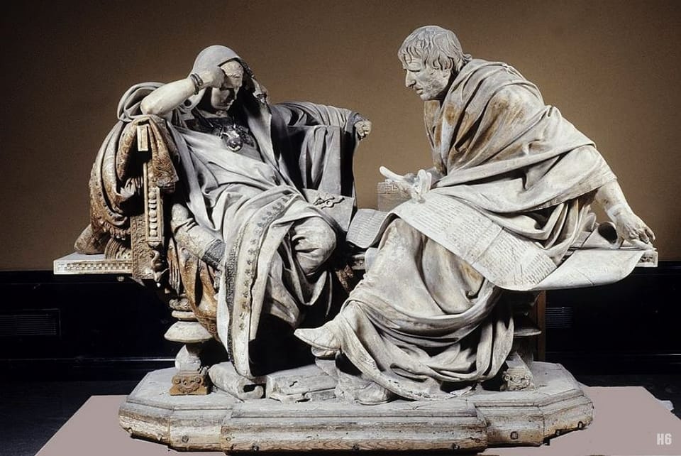 Seneca talking to Nero in plaster statue at Prado Museum in Spain